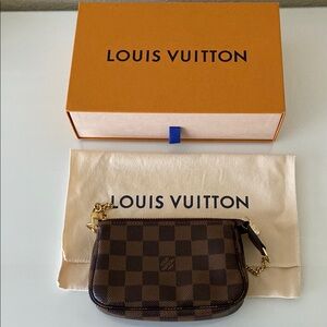 Louis Vuitton Mini Pochette in Damier Ebene